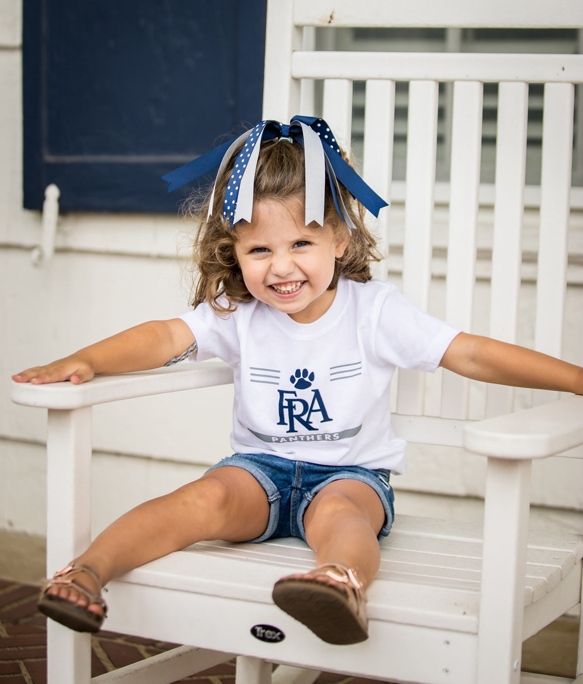 Young child wearing FRA Spirit Store apparel.