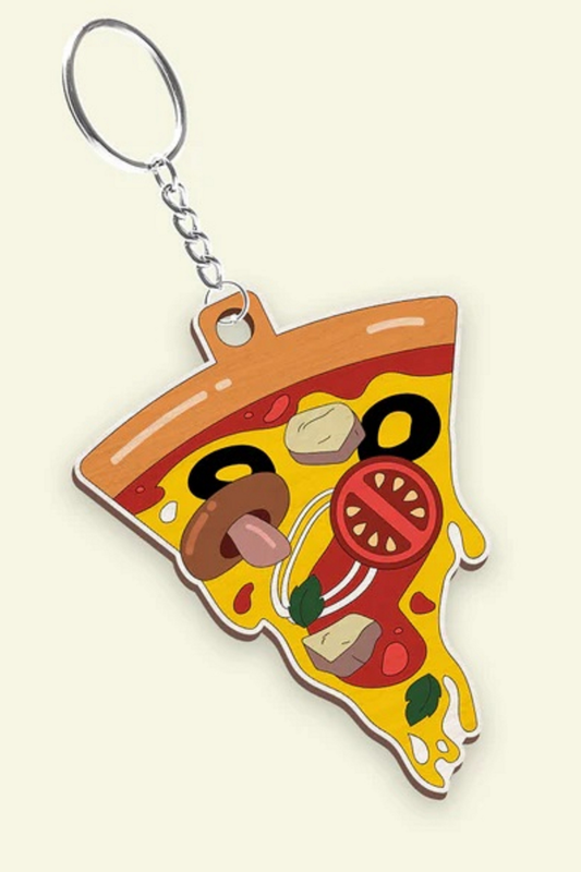 Keychain shaped like a slice of pizza with cartoon-style toppings on a beige background